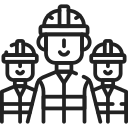 Three construction workers in hard hats smiling, representing professional services for driveways and patios in Wicklow